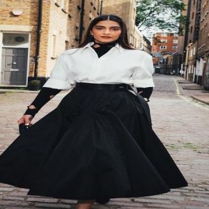 Sonam Kapoor Glams Up In White Blouse And Black Skirt