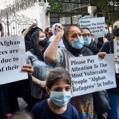 Afghan refugees protest outside UNHCR building in Indonesia over delay in processing asylum applications