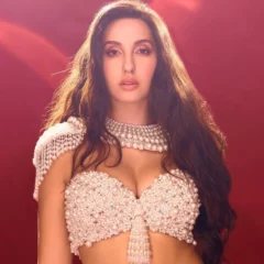 Nora Fatehi Stuns In Pearl Deep-Neck Bralette And Thigh-Slit Skirt