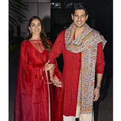 Newlyweds Sidharth Malhotra & Kiara Advani Twin In Red As They Walk Out Of Delhi Airport
