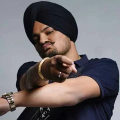 Sidhu Moose Wala's Parents Get Singer's Tattoo Inked On Their Arms