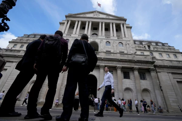 Bank of England raises interest rates, forecasts shallower recession