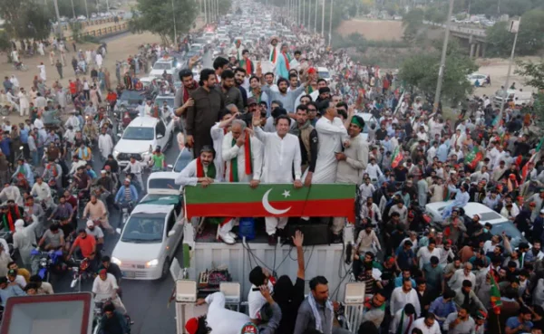 Imran Khan’s supporters gather outside his home after Punjab’s caretaker government withdraws security